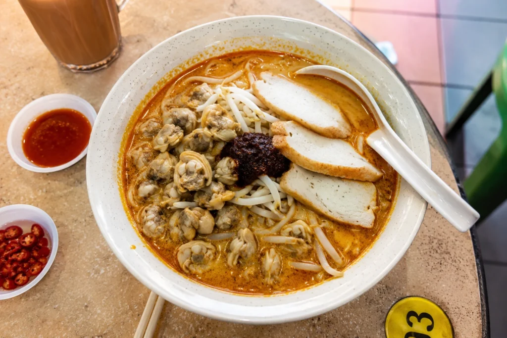 928 Yishun Laksa bowl with cockles and fishcake at Chong Pang Market