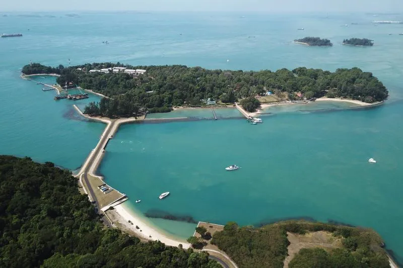 Tropical coastal scenery and calm water around St John’s Island Singapore